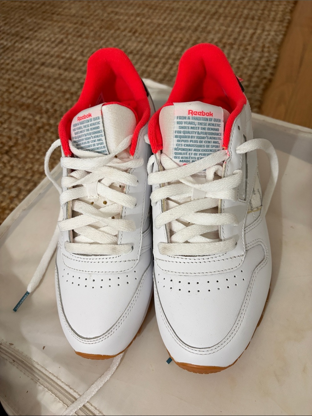 Reebok women’s 7.5  White Sneakers with Red Interior and Gum Outsole-